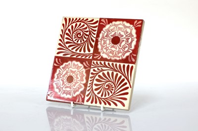 Lot 42 - A set of twelve 'Rose and Scroll' ruby lustre tiles