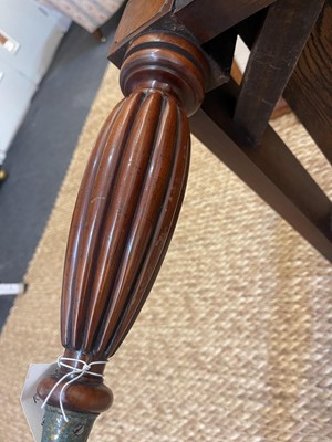 Lot 6 - A Regency-style mahogany and leather stool