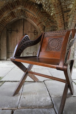 Lot 8 - A pair of carved oak Glastonbury chairs