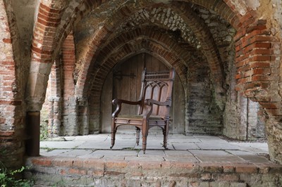 Lot 14 - A Victorian Gothic Revival oak armchair