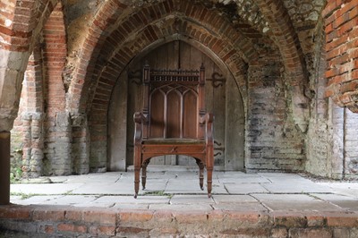 Lot 14 - A Victorian Gothic Revival oak armchair
