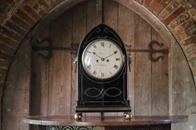 Lot 3 - A Regency ebonised table clock
