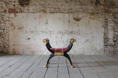 Lot 11 - A Regency-style ebonised stool