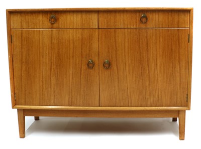 Lot 442 - A Gordon Russell walnut and teak dining room suite