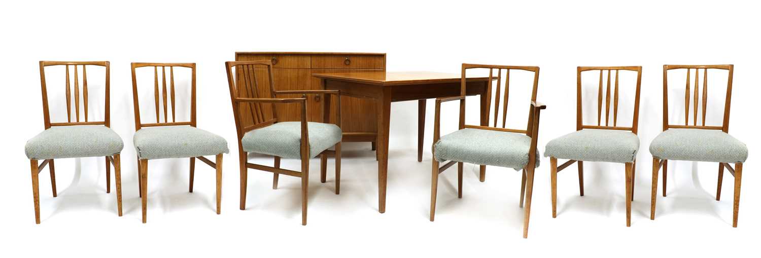 Lot 442 - A Gordon Russell walnut and teak dining room suite