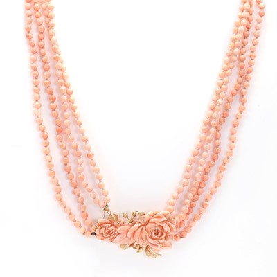 Lot 192 - A four row uniform coral bead necklace