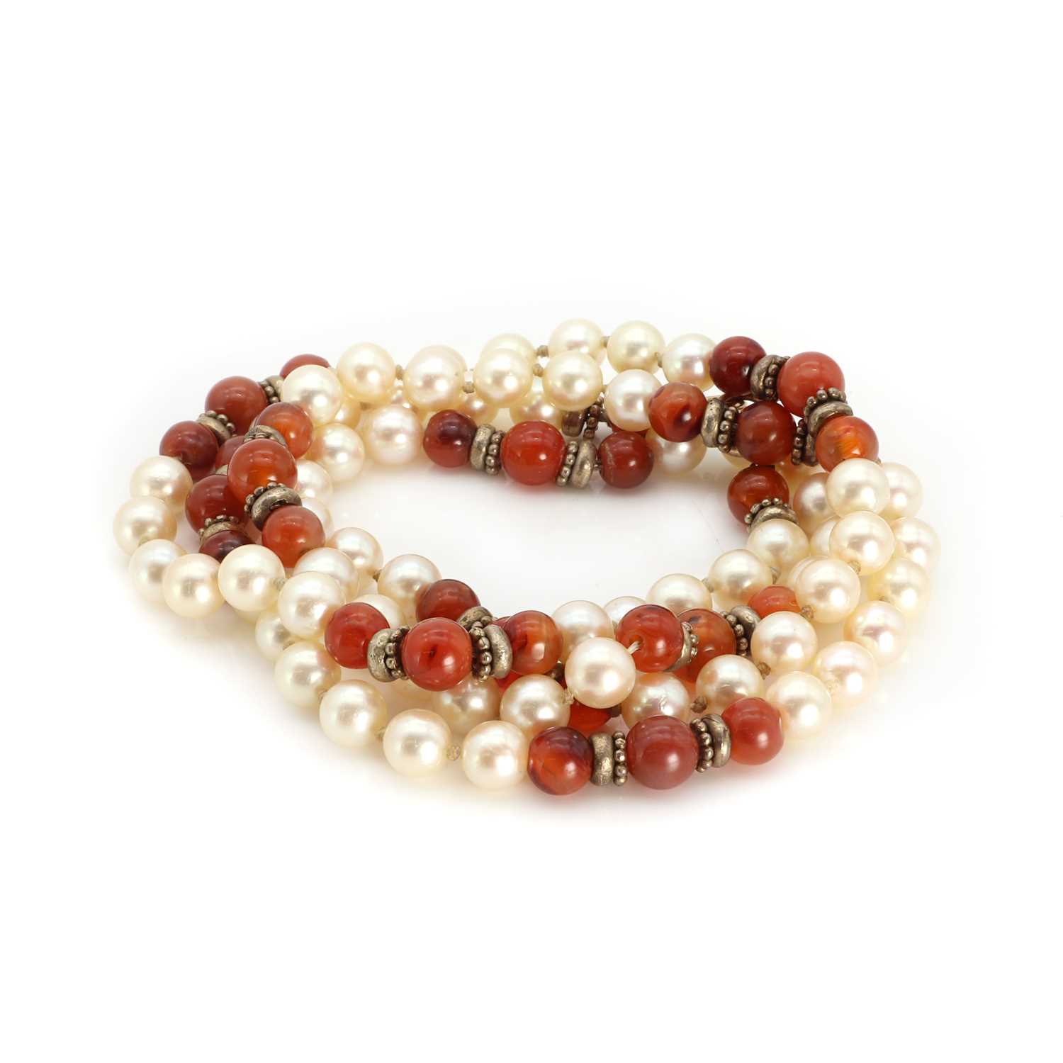 Lot 1208 - A single row cultured pearl and cornelian bead necklace