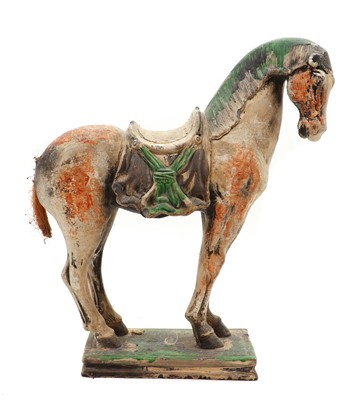 Lot 154 - A Chinese pottery horse