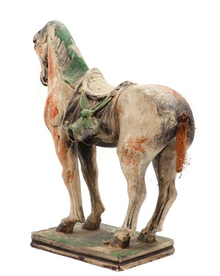 Lot 154 - A Chinese pottery horse