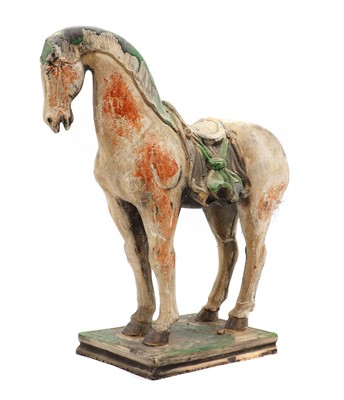 Lot 154 - A Chinese pottery horse