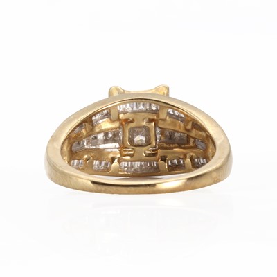 Lot 1056 - A 9ct gold diamond set rectangular cluster ring