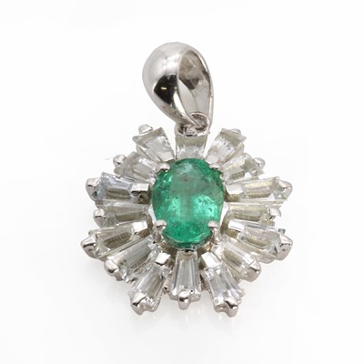 Lot 1142 - A 9ct white gold emerald and white sapphire ballerina cluster pendant