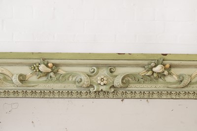 Lot 497 - A carved and painted wooden overmantel mirror