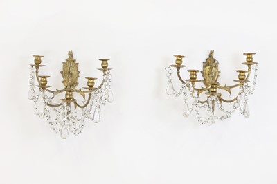 Lot 530 - A pair of gilt-metal and glass wall lights