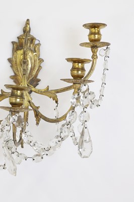 Lot 530 - A pair of gilt-metal and glass wall lights
