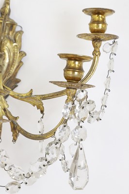 Lot 530 - A pair of gilt-metal and glass wall lights