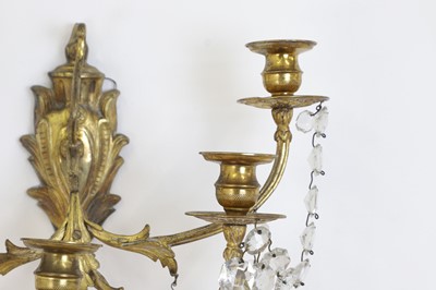 Lot 530 - A pair of gilt-metal and glass wall lights