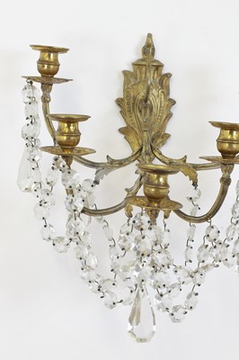 Lot 530 - A pair of gilt-metal and glass wall lights