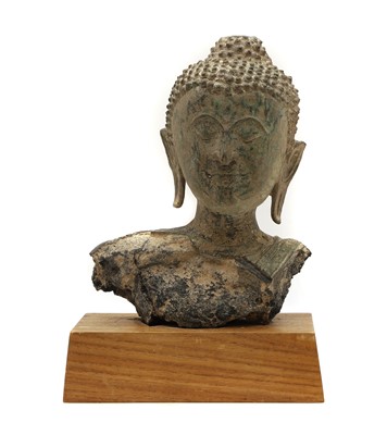 Lot 90 - A bronze Buddha head
