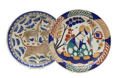 Lot 228 - Two Iznik style pottery chargers