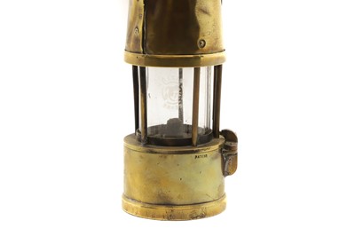Lot 333 - 'The Protector': A brass miner's lamp