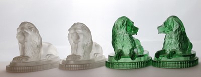 Lot 112 - Two pairs of John Derbyshire pressed glass lions