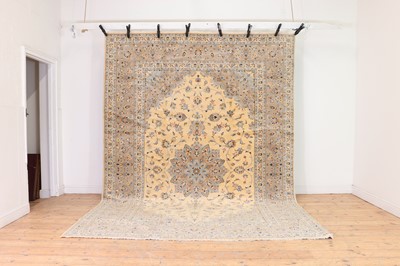 Lot 216 - A Kashan carpet