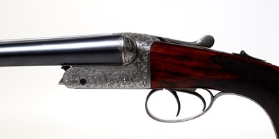 Lot 313 - A matched pair of 12-bore boxlock ejector shotguns