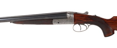Lot 313 - A matched pair of 12-bore boxlock ejector shotguns