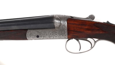 Lot 313 - A matched pair of 12-bore boxlock ejector shotguns