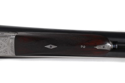 Lot 313 - A matched pair of 12-bore boxlock ejector shotguns