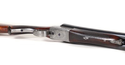Lot 313 - A matched pair of 12-bore boxlock ejector shotguns