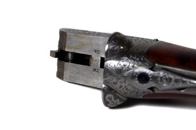 Lot 313 - A matched pair of 12-bore boxlock ejector shotguns