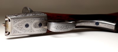 Lot 313 - A matched pair of 12-bore boxlock ejector shotguns