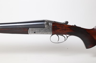 Lot 313 - A matched pair of 12-bore boxlock ejector shotguns