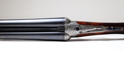 Lot 313 - A matched pair of 12-bore boxlock ejector shotguns