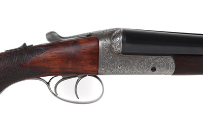 Lot 313 - A matched pair of 12-bore boxlock ejector shotguns