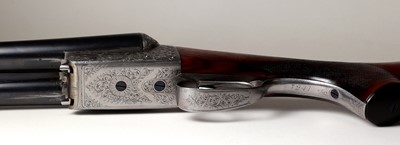 Lot 313 - A matched pair of 12-bore boxlock ejector shotguns