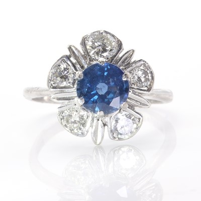 Lot 150 - An 18ct white gold sapphire and diamond floral cluster ring