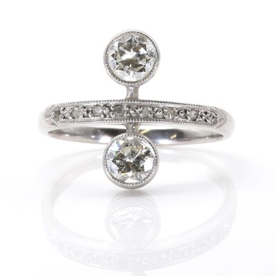 Lot 45 - A vertical two stone diamond ring