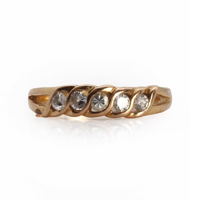 Lot 1046 - A gold five stone diamond ring