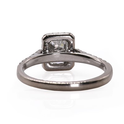 Lot 102 - An 18ct white gold emerald cut diamond rectangular cluster ring