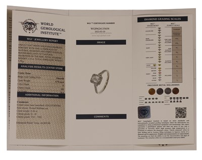 Lot 102 - An 18ct white gold emerald cut diamond rectangular cluster ring