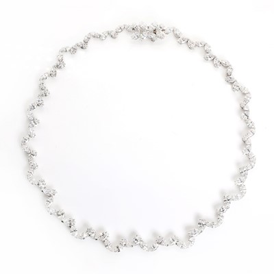 Lot 138 - An 18ct white gold graduated marquise diamond rivière necklace, by Asprey