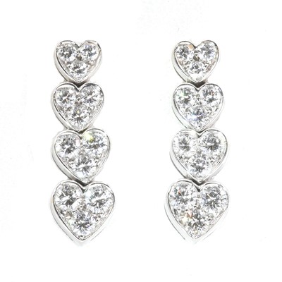 Lot 171 - A pair of white gold articulated heart diamond drop earrings