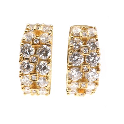 Lot 239 - A pair of 18ct gold and diamond cuff style earrings