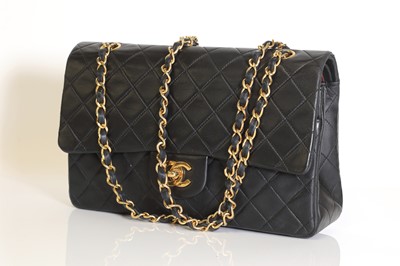 Lot 318 - A Chanel black quilted lambskin flap bag