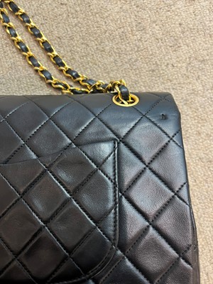 Lot 318 - A Chanel black quilted lambskin flap bag