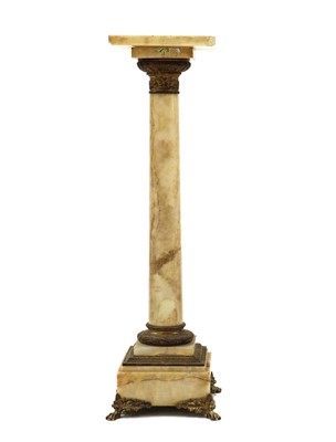 Lot 498 - An alabaster pedestal