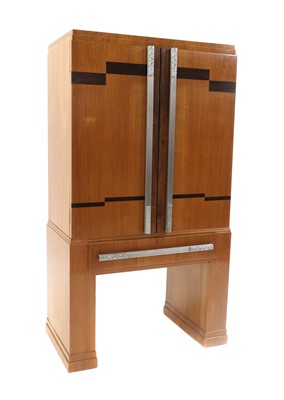Lot 568 - An Art Deco walnut cocktail cabinet
